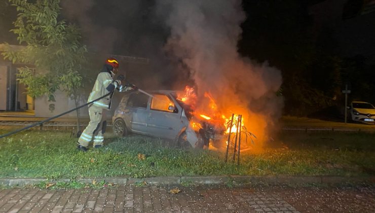 Taklalar atan otomobil alev aldı, sürücü son anda kurtarıldı